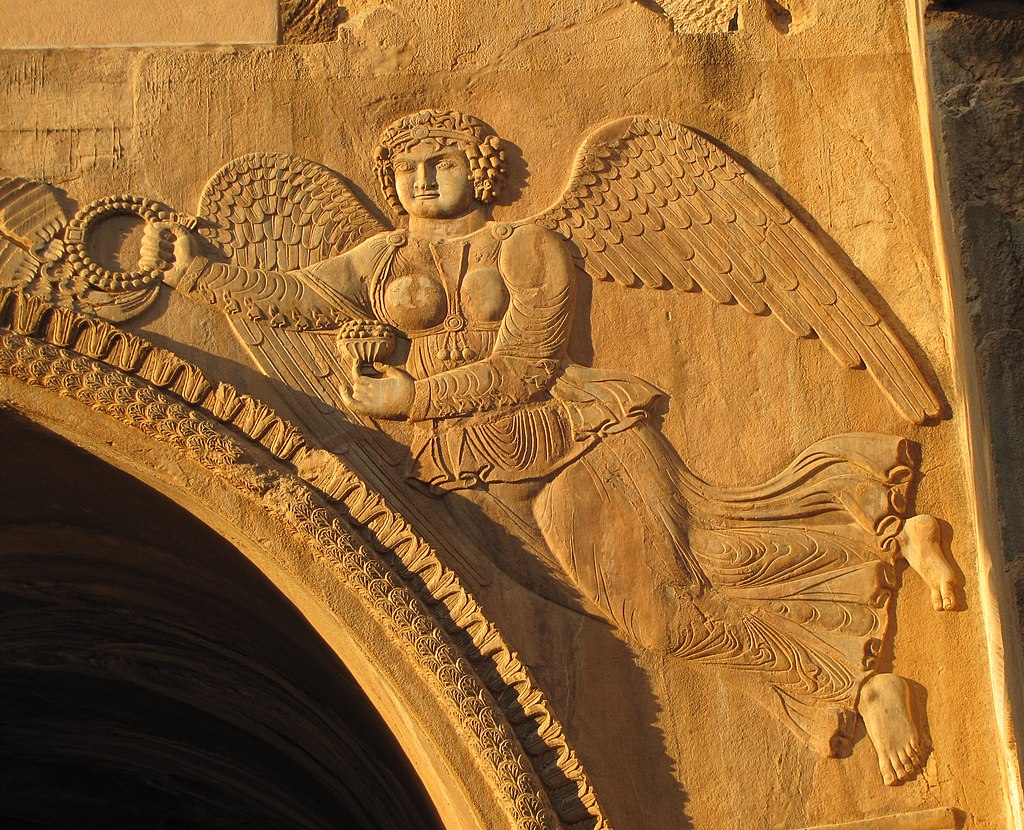 A very Greek-looking Nike on a 4th century CE Sasanian arch in Taq Bostan